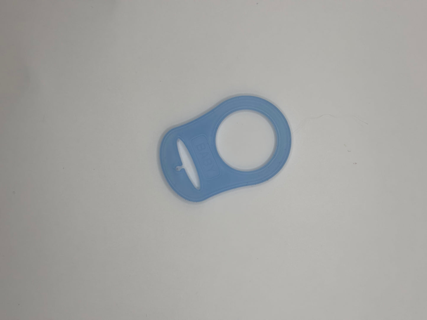 Adaptateur en silicone pour attache tétine