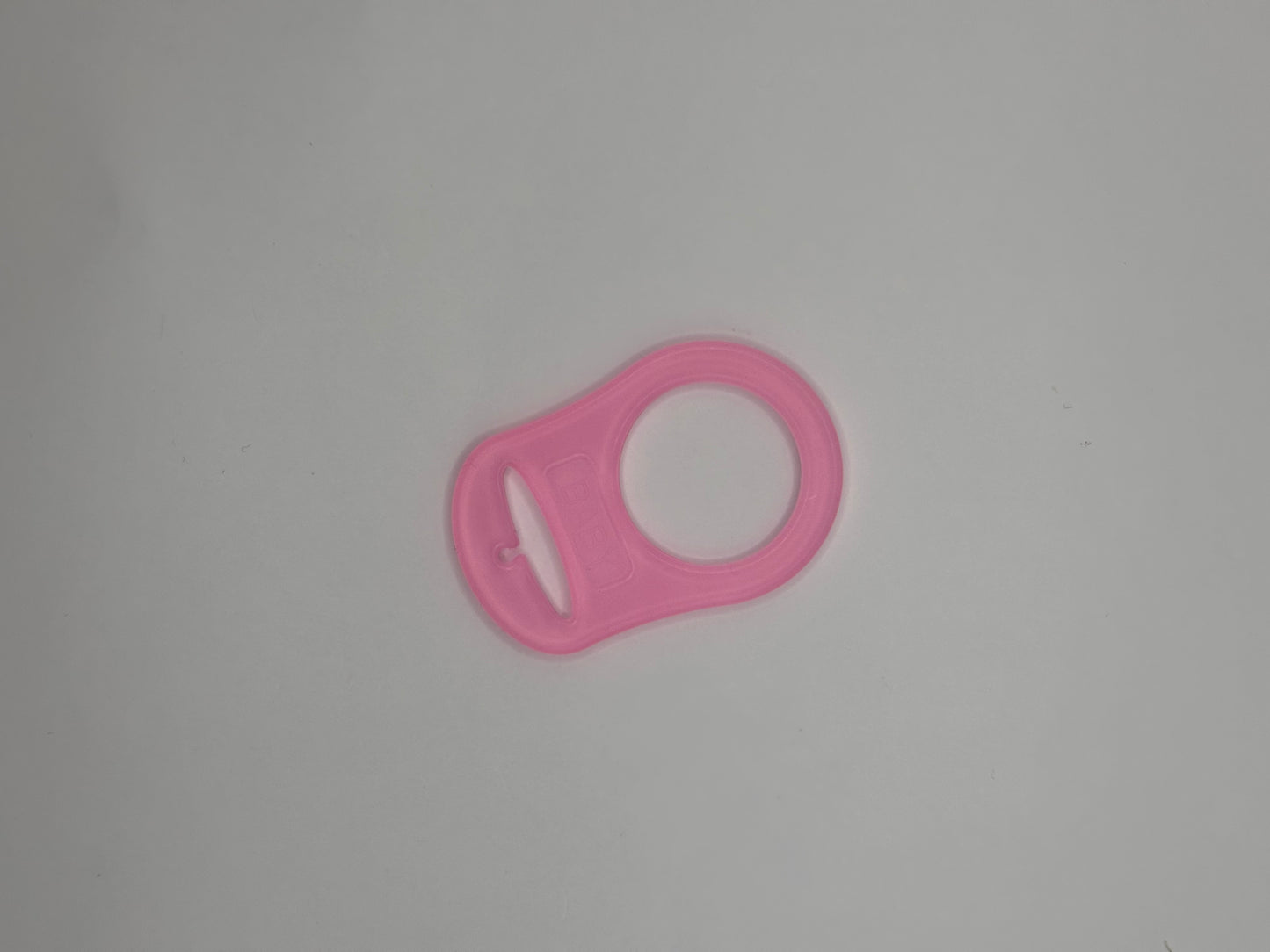 Adaptateur en silicone pour attache tétine