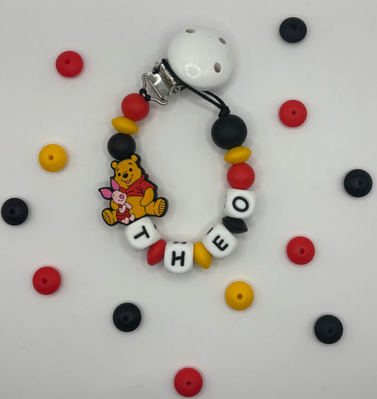 Attache tétine Winnie L’ourson