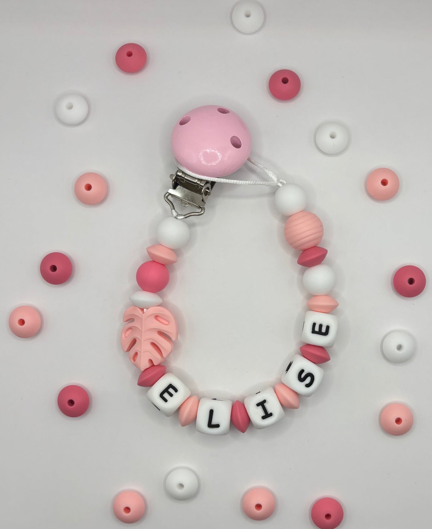 Attache tétine rose feuille Monster