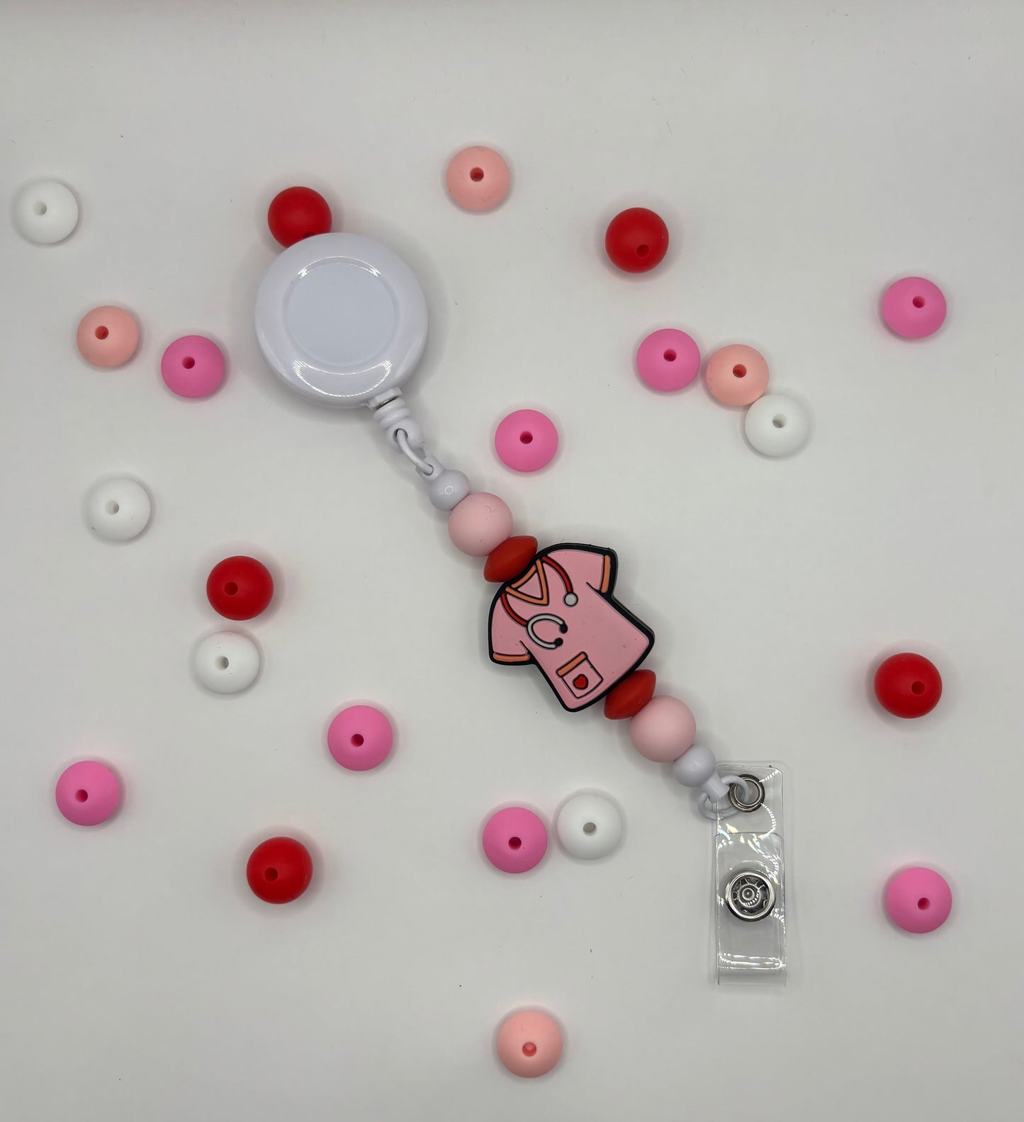 Attache rétractable pour badge