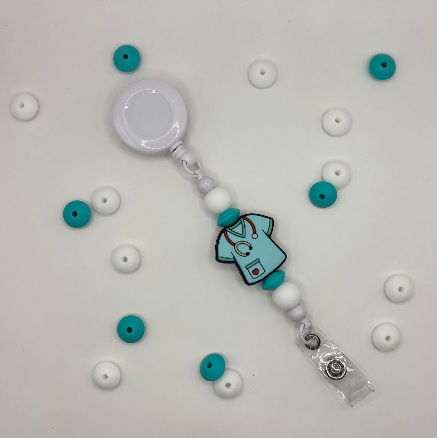 Attache rétractable pour badge