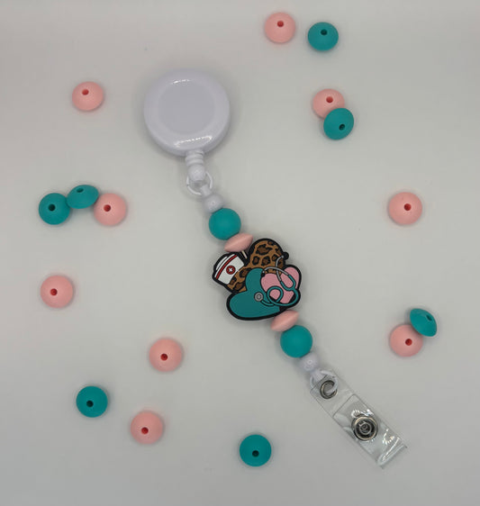 Attache rétractable pour badge