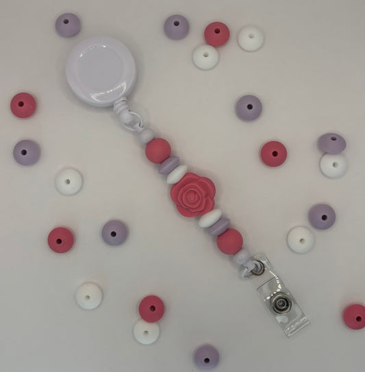 Attache rétractable pour badge