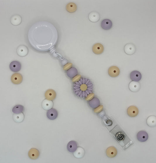 Attache rétractable pour badge