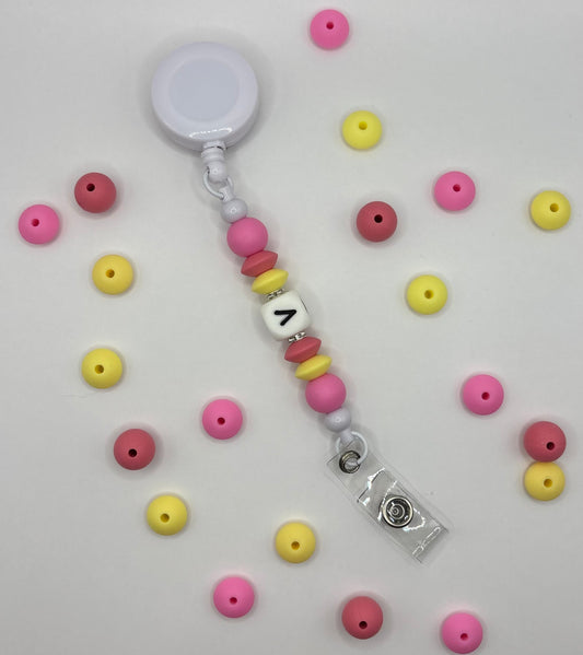 Attache rétractable pour badge