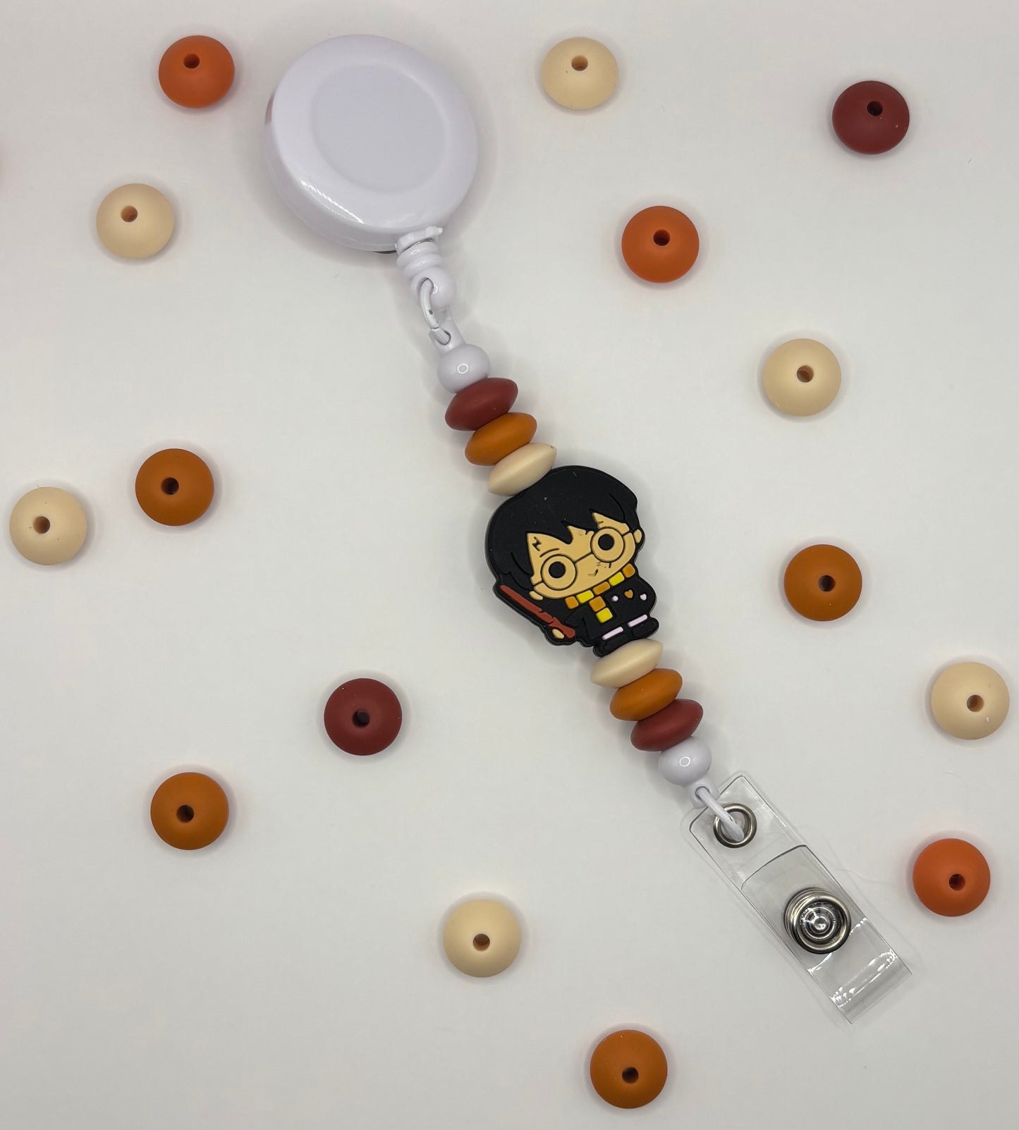 Attache rétractable pour badge