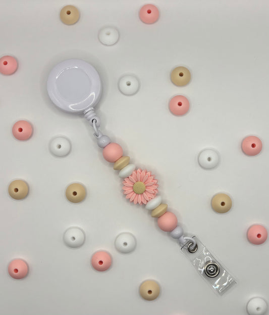 Attache rétractable pour badge